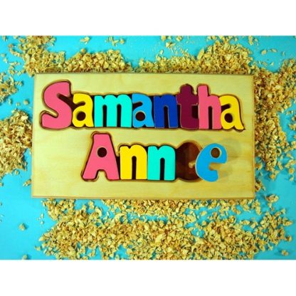 A wooden puzzle with the name Samantha Anne on it.