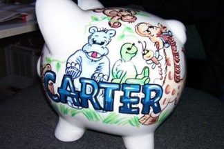 A piggy bank with the name Carter on it.